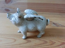 PETIT COCHON : TIRELIRE EN FONTE PEINTE