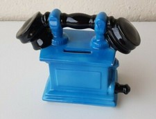 ANCIENNE TIRELIRE  EN FORME DE