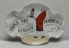 Très beau cendrier Triple sec Guillot Bordeaux