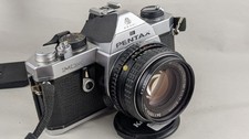 Reflex argentique vintage Pentax MX - objectif PentaxM 1.7/50 mm + filtre Pentax