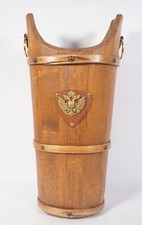 Old wooden umbrella stand with metal coat of arms Austria-Hungary double eagle head