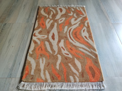 Tapis marron noué - noué, la