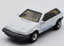 Matchbox Superfast Volvo 480 ES blanc. Jantes 8 trous. Plaque de base Macao