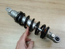 UN AMORTISSEUR ARRIERE MOTO