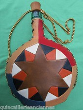 Bouteille VIRESA verre teinté vert habillé genre cuir cousue chaîne ancienne 