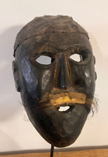 Wooden ceremonial mask of Nepal, Himalayas. Wood, leather and hair.