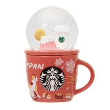 Boule à neige et tasse de