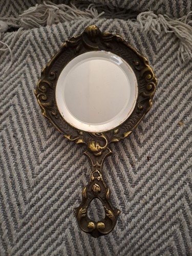 Miroir rond doré ancien