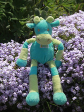 Doudou Peluche girafe vache