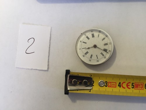 Fob watch mechanism for - fob,