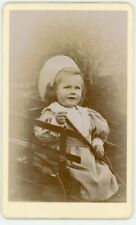 PHOTO CDV, a child poses on a wheelchair fashion fashion
