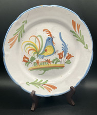Antique earthenware plate, stylized bird decor, 19th century »