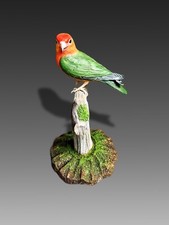 Highly realistic, true-to-size hand-carved Agapornis roseicollis bird artwork