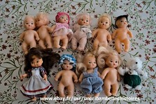 Lot of 10 small dolls including one Delavennat