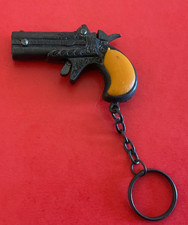 Porte clefs pistolet à amorce
