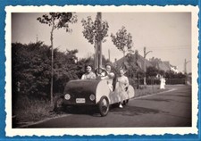 vintage photo women in large pedal toy car ca 1950 Belgium cuistax