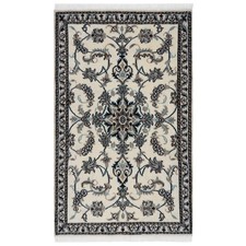 Tapis oriental noué à la