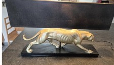 Lampe design panthère dorée