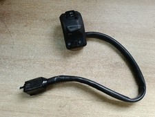 UN COMMODO COMMANDE GAUCHE