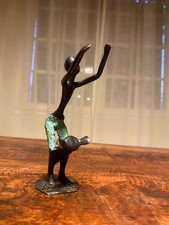 Bronze statuette, African tam-tam, lost wax. Mid 20th century.