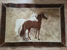 Tapis ou décoration murale en cuir véritable(peau de vache ou de veau)