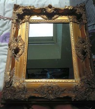 Miroir ancien en bois sculpté