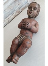 Chérubin en bois sculpté -