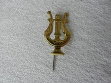 insigne clique lyre musique