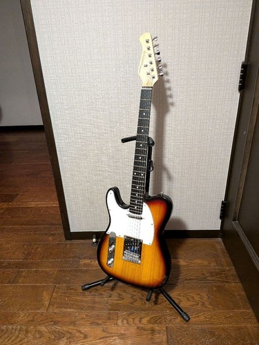 Guitare modèle gauche - , donner