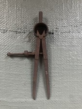 Ancien compas a ressort. Objet