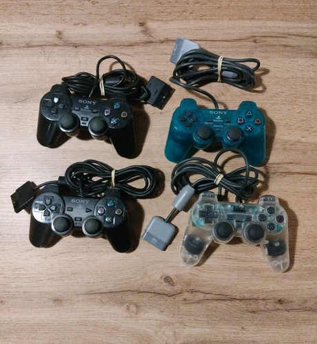 Lot manettes ps2 hors - hs, /