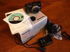 Panasonic Lumix GF1 + Olympus