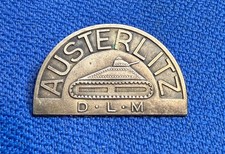 AUSTERLITZ D.L.M MECHANICAL LIGHT DIVISION BADGE G.MORET