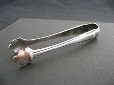 Très belle pince à sucre