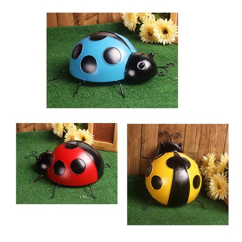 Figurine coccinelle peinte - , à