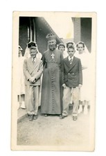Priest in robe at communion   ,  Vintage found  snapshot religious photograph