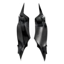 Cache latéraux de réservoir