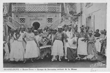 GUADELOUPE LOW EARTH group of maids coming out of Mass