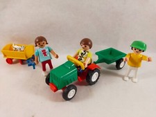 nice kid with Playmobil tractor (park, garden) 1583