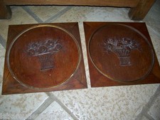 pair of oval wooden paintings carved flowers 19th century