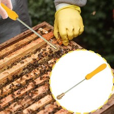 Enfouisseur de fil apicole