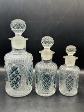 Suite of glass bottles star and diamond decor