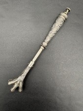 Pince à sucre à système