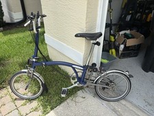 Brompton Mid Height Handle Bar.   Superlight Titanium Rear And Front Fork.