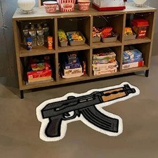 Tapis en forme de pistolet