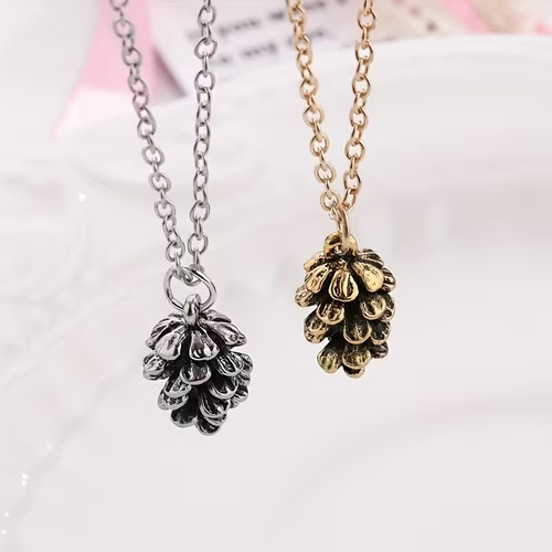 Collier femme pomme de pin - ✨,