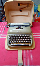 old 1957 OPTIMA elite 3 typewriter in suitcase works