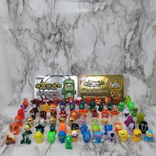 Lot of 73 GoGo's Crazy Bones Figurines With 2 Collector Tins & 1 Bag
