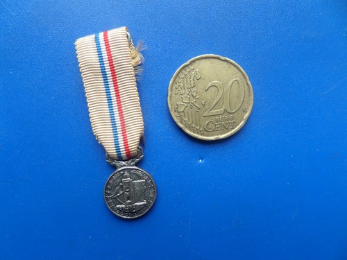 Médaille réduction fncpg - réduction,