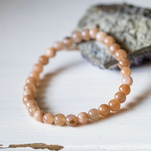 Bracelet pierre soleil ou - de,